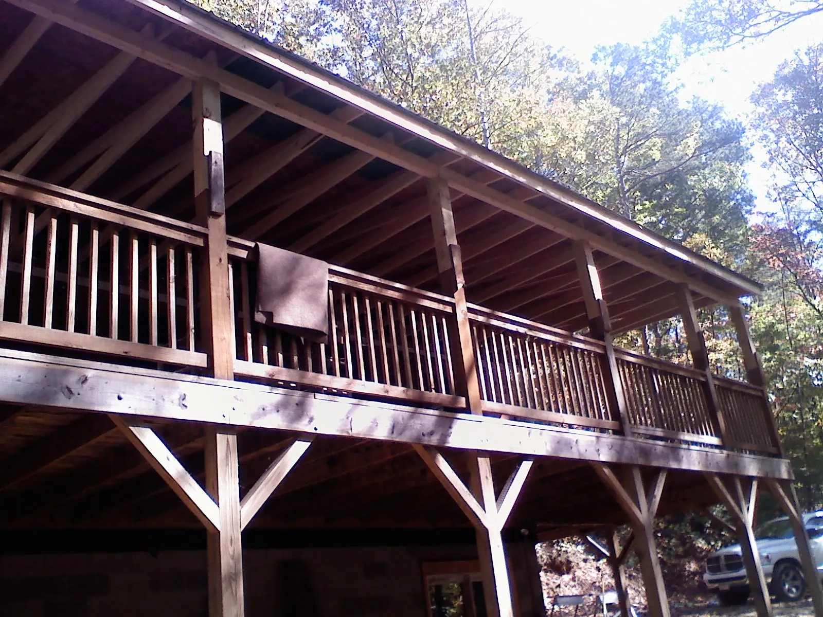 Timber framing under a new elevated porch and deck — Roof Leak Repair in West Sayville by Roofing Brothers